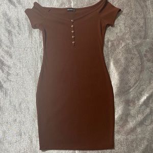 This is a Popular 21 mini dress in color brown and gold buttons